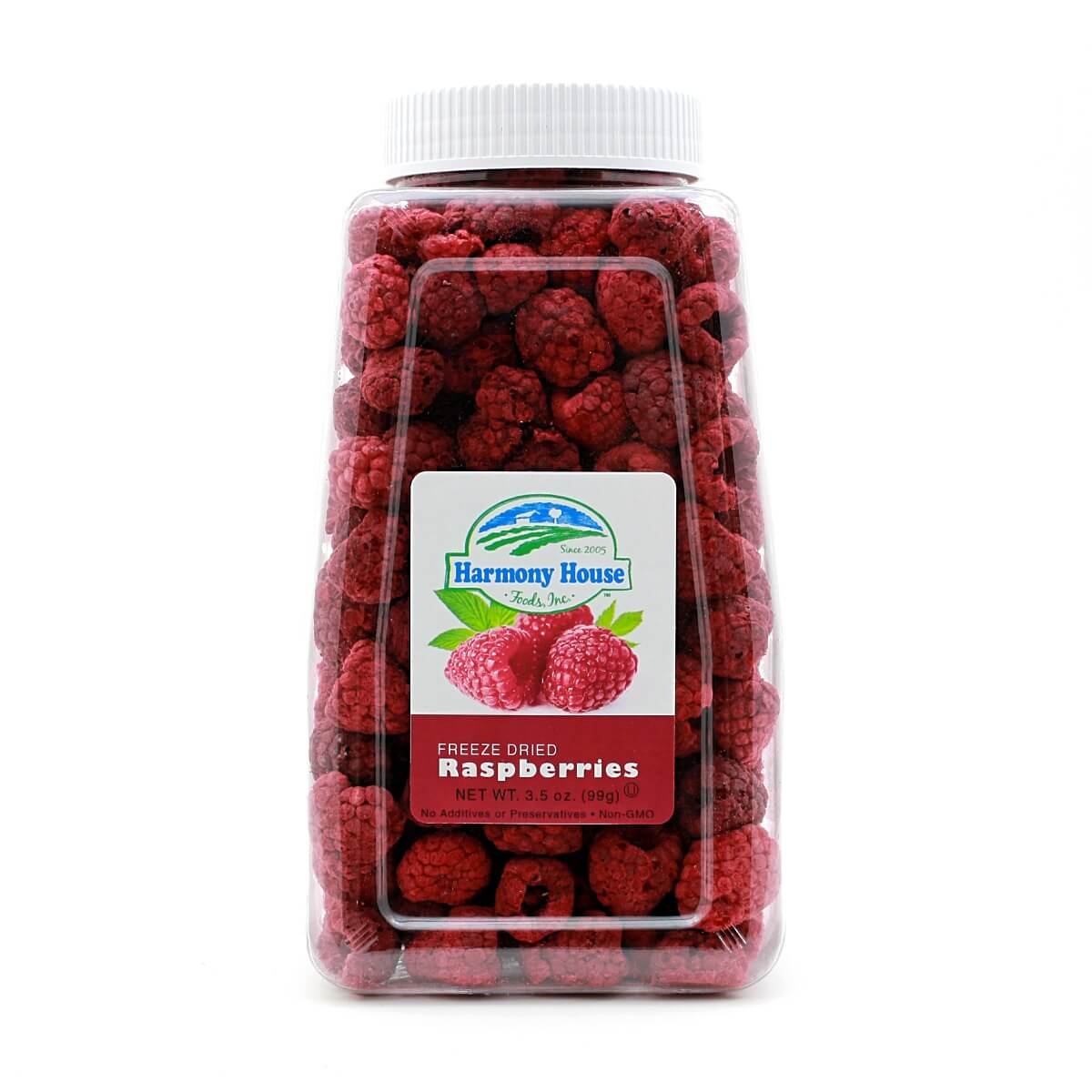 A jar of Harmony House Freeze Dried Raspberries on a white background.